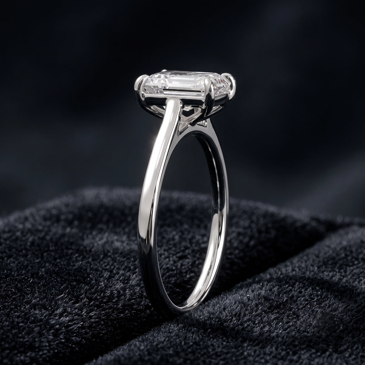 Emerald Cut Solitaire Diamond Ring with Classic Four-Prong Setting  Category: Solitaire