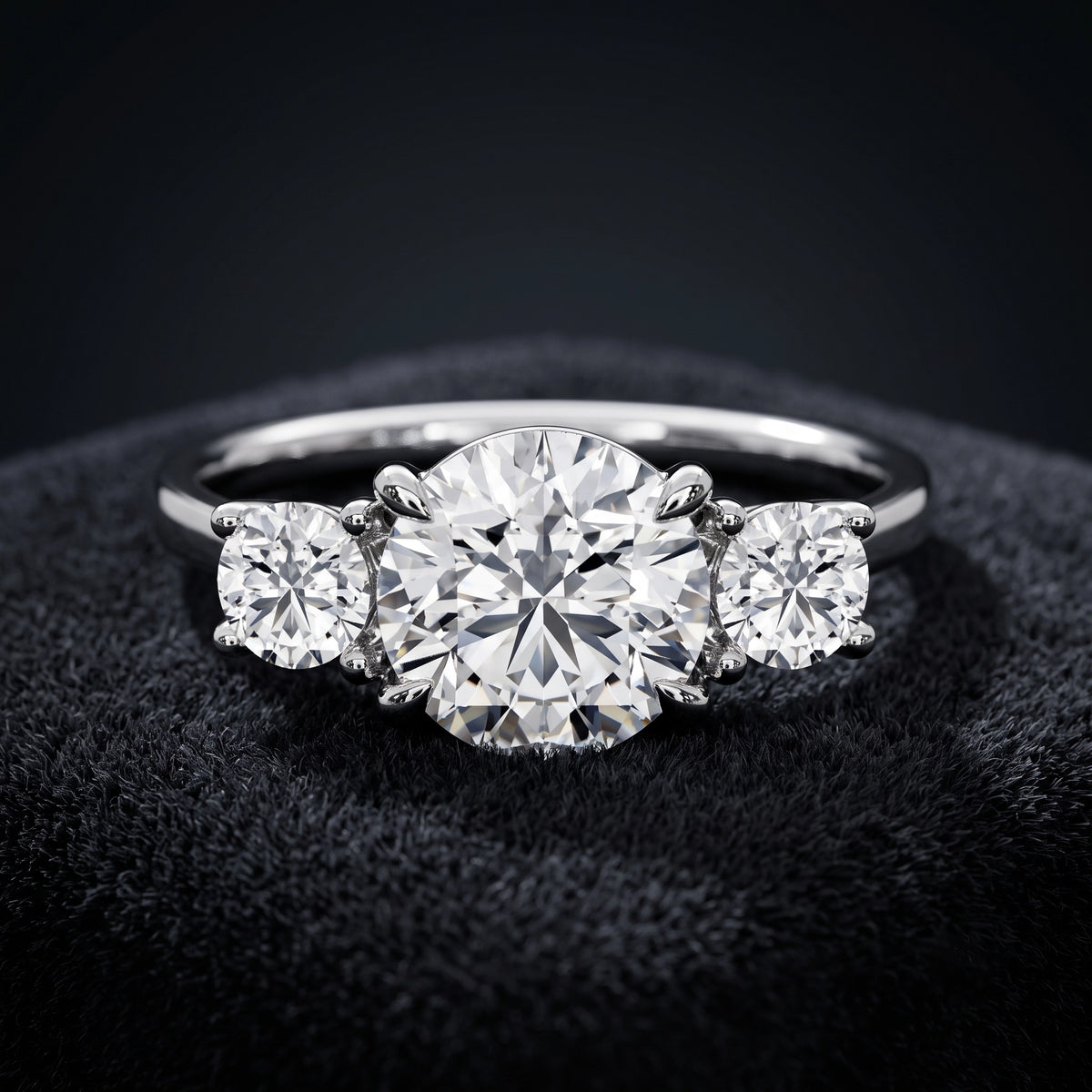 Three Stone Diamond Ring with Oval Center Stone and Round Side Diamonds