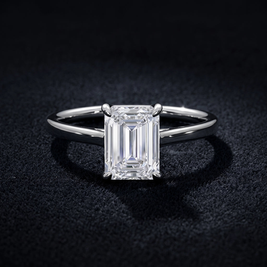 Emerald Cut Solitaire Diamond Ring with Classic Four-Prong Setting  Category: Solitaire