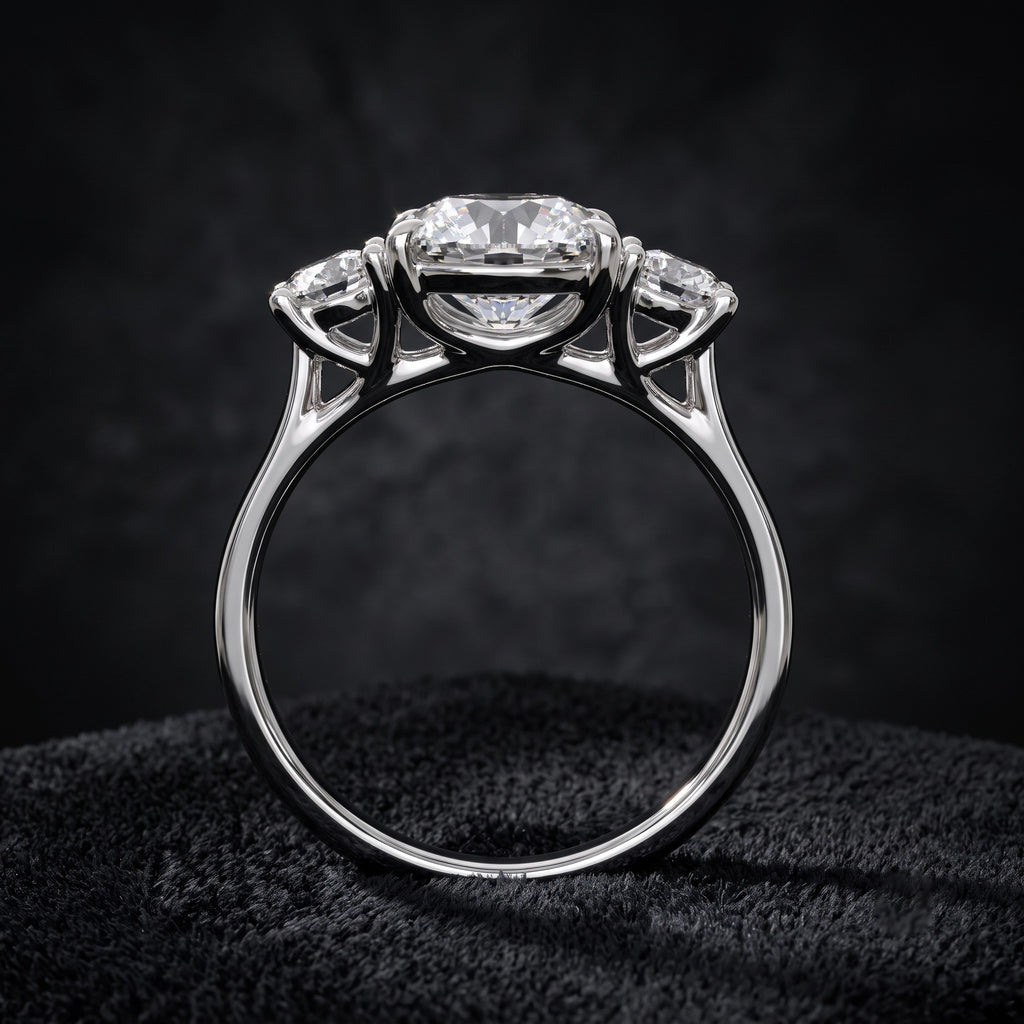 Three Stone Diamond Ring with Oval Center Stone and Round Side Diamonds