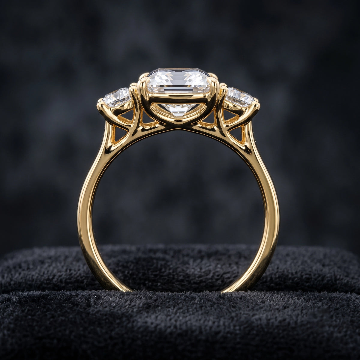 Three Stone Diamond Ring with Oval Center Stone and Round Side Diamonds