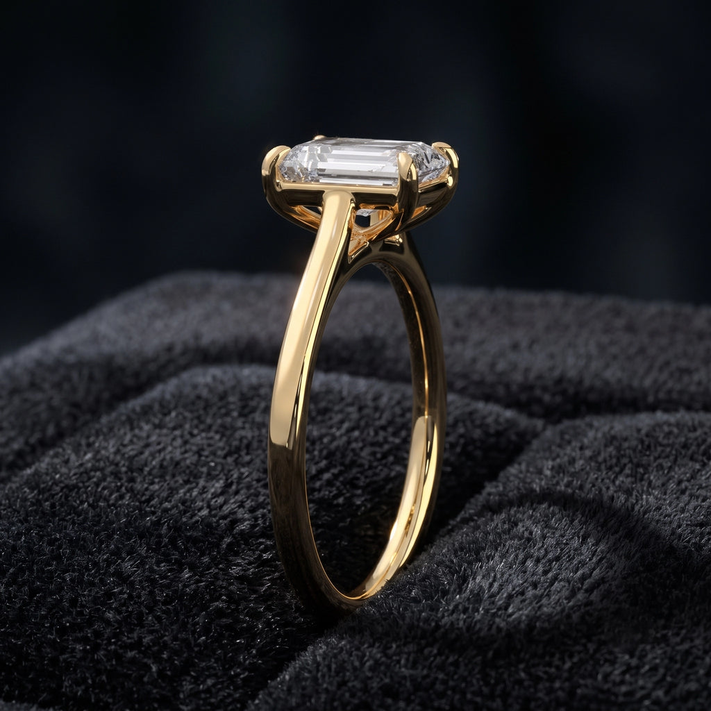 Emerald Cut Solitaire Diamond Ring with Classic Four-Prong Setting  Category: Solitaire