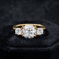 Three Stone Diamond Ring with Oval Center Stone and Round Side Diamonds